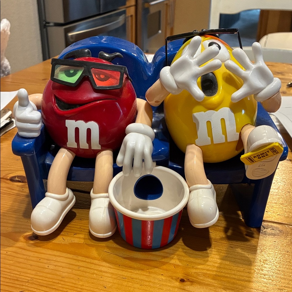 M&M'S Red and Yellow Figures on Blue Seat